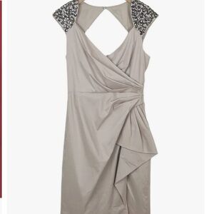 Only wore once to holiday party.